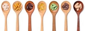 Verschillende supplementen op houten lepels Verschillende supplementen op houten lepels