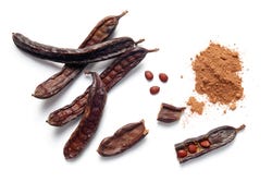 Peulen van de Johannesbroodboom, ook wel carob genoemd Peulen van de Johannesbroodboom, ook wel carob genoemd