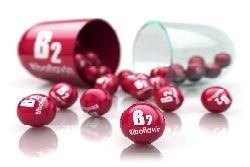 Illustratie van een capsule met vitamine B2 Illustratie van een capsule met vitamine B2